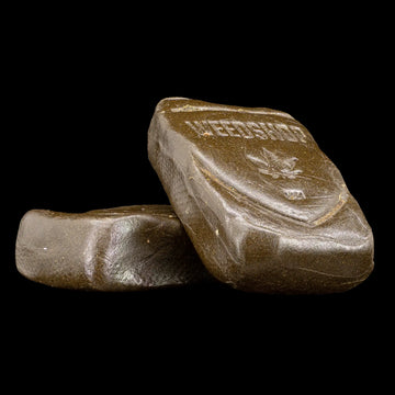 Farfar's Favorit THCA hash showing fibrous structure and traditional terpene profile